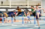 21 January 2023; Ryan Onoh of Leevale AC, Cork, centre, competes in the 60m hurdles event of the juvenile pentathlon during day one of the 123.ie National Indoor Combined Events at the TUS International arena in Athlone, Westmeath. Photo by Sam Barnes/Sportsfile