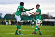 21 January 2023; Jaden Umeh of Republic of Ireland celebrates with teammate Brody Lee, right, after scoring their side's third goal during the International friendly match between Republic of Ireland U15's and Australia U16's at the FAI National Training Centre in Dublin. Photo by Ben McShane/Sportsfile