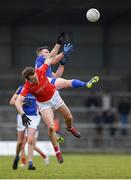 21 January 2023; Michael Quinn of Longford in action against Bevan Duffy of Louth during the O'Byrne Cup Final match between Longford and Louth at Glennon Brothers Pearse Park in Longford. Photo by Ray McManus/Sportsfile
