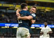 21 January 2023; Jimmy O'Brien of Leinster, left, celebrates with teammate Jordan Larmour after scoring his side's first try during the Heineken Champions Cup Pool A Round 4 match between Leinster and Racing 92 at Aviva Stadium in Dublin. Photo by Harry Murphy/Sportsfile