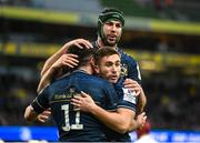 21 January 2023; Jimmy O'Brien of Leinster, left, celebrates with teammates Jordan Larmour and Caelan Doris after scoring his side's first try during the Heineken Champions Cup Pool A Round 4 match between Leinster and Racing 92 at Aviva Stadium in Dublin. Photo by Harry Murphy/Sportsfile