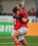 21 January 2023; Munster players Aoife Doyle and Heather Kennedy of Munster celebrate after the match in the Vodafone Women’s Interprovincial Championship Round Three match between Connacht and Munster at The Sportsground in Galway. Photo by Ray Ryan/Sportsfile