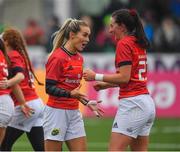 21 January 2023; Munster players Aoife Doyle and Heather Kennedy of Munster celebrate after the match in the Vodafone Women’s Interprovincial Championship Round Three match between Connacht and Munster at The Sportsground in Galway. Photo by Ray Ryan/Sportsfile