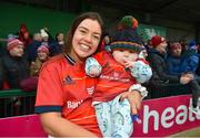 21 January 2023; Maeve Óg O’Leary of Munster celebrate with 6 month old Tahg Guckian after the match the Vodafone Women’s Interprovincial Championship Round Three match between Connacht and Munster at The Sportsground in Galway. Photo by Ray Ryan/Sportsfile