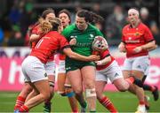 21 January 2023; Shannon Touhey of Connacht tries to break away from Munster players Alana McInerney and Nicole Cronin during the Vodafone Women’s Interprovincial Championship Round Three match between Connacht and Munster at The Sportsground in Galway. Photo by Ray Ryan/Sportsfile