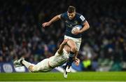 21 January 2023; Ross Byrne of Leinster evades the tackle of Olivier Klemenczak of Racing 92 during the Heineken Champions Cup Pool A Round 4 match between Leinster and Racing 92 at Aviva Stadium in Dublin. Photo by Harry Murphy/Sportsfile