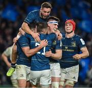 21 January 2023; Hugo Keenan of Leinster, left, celebrates with team-mates Luke McGrath, Jordan Larmour and Dan Sheehan after scoring their side's fourth try during the Heineken Champions Cup Pool A Round 4 match between Leinster and Racing 92 at Aviva Stadium in Dublin. Photo by Brendan Moran/Sportsfile