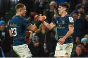 21 January 2023; Jimmy O'Brien of Leinster celebrates with teammate Scott Penny after scoring his side's fifth try during the Heineken Champions Cup Pool A Round 4 match between Leinster and Racing 92 at Aviva Stadium in Dublin. Photo by Harry Murphy/Sportsfile