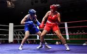 21 January 2023; Bethany Doocey of Castlebar Boxing Club, Mayo, and Dearbhla Tinnelly of Clann Naofa Boxing Club, Louth, during their light heavyweight 81kg final bout at the IABA National Elite Boxing Championships Finals at the National Boxing Stadium in Dublin. Photo by Seb Daly/Sportsfile