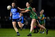 21 January 2023; Máire O'Shaughnessy of Meath in action against Hannah Tyrrell of Dublin during the Lidl Ladies National Football League Division 1 match between Dublin and Meath at DCU St Clare's in Dublin. Photo by Eóin Noonan/Sportsfile