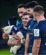 21 January 2023; Luke McGrath of Leinster with his son Bobby, age 7 months and team mates, from left, Jack Conan, Harry Byrne and Scott Penny after the Heineken Champions Cup Pool A Round 4 match between Leinster and Racing 92 at Aviva Stadium in Dublin. Photo by David Fitzgerald/Sportsfile