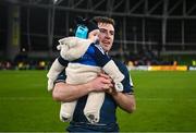 21 January 2023; Luke McGrath of Leinster with his son Bobby, aged seven months, after his side's victory in the Heineken Champions Cup Pool A Round 4 match between Leinster and Racing 92 at Aviva Stadium in Dublin. Photo by Harry Murphy/Sportsfile