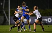 21 January 2023; Jenny Murphy of Leinster is tackled by Brenda Barr, left, and India Daley of Ulster during the Vodafone Women’s Interprovincial Championship Round Three match between Ulster and Leinster at Queen’s Sport in Belfast. Photo by Ramsey Cardy/Sportsfile