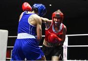 21 January 2023; Winnie Christina McDonagh of Neilstown Boxing Club, Dublin, right, and Shauna Browne O’Keefe of Clonmel Boxing Club, Tipperary, during their light welterweight 63kg final bout at the IABA National Elite Boxing Championships Finals at the National Boxing Stadium in Dublin. Photo by Seb Daly/Sportsfile