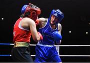 21 January 2023; Shauna Browne O’Keefe of Clonmel Boxing Club, Tipperary, right, and Winnie Christina McDonagh of Neilstown Boxing Club, Dublin during their light welterweight 63kg final bout at the IABA National Elite Boxing Championships Finals at the National Boxing Stadium in Dublin. Photo by Seb Daly/Sportsfile