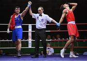 21 January 2023; Christopher O’Reilly of Holy Family Drogheda Boxing Club, Louth, left, celebrates after victory over Joshua Olaniyan of Jobstown Boxing Club, Dublin, in their middleweight 75kg final bout at the IABA National Elite Boxing Championships Finals at the National Boxing Stadium in Dublin. Photo by Seb Daly/Sportsfile