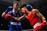 21 January 2023; Christopher O’Reilly of Holy Family Drogheda Boxing Club, Louth, left, and Joshua Olaniyan of Jobstown Boxing Club, Dublin, during their middleweight 75kg final bout at the IABA National Elite Boxing Championships Finals at the National Boxing Stadium in Dublin. Photo by Seb Daly/Sportsfile