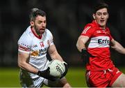 21 January 2023; Matthew Donnelly of Tyrone in action against Padraig McGrogan of Derry during the Bank of Ireland Dr McKenna Cup Final match between Derry and Tyrone at Athletic Grounds in Armagh. Photo by Oliver McVeigh/Sportsfile