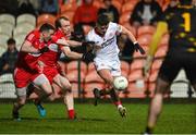 21 January 2023; Michael McKernan of Tyrone in action against Padraig Cassidy and Conor Doherty of Derry during the Bank of Ireland Dr McKenna Cup Final match between Derry and Tyrone at Athletic Grounds in Armagh. Photo by Oliver McVeigh/Sportsfile