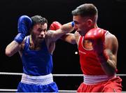 21 January 2023; Sean Purcell of Saviours Crystal Boxing Club, Waterford, left, and Paul Loonam of St Carthages Boxing Club, Offaly, during their featherweight 57kg final bout at the IABA National Elite Boxing Championships Finals at the National Boxing Stadium in Dublin. Photo by Seb Daly/Sportsfile