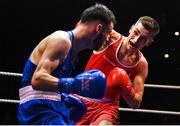 21 January 2023; Paul Loonam of St Carthages Boxing Club, Offaly, right, and Sean Purcell of Saviours Crystal Boxing Club, Waterford, during their featherweight 57kg final bout at the IABA National Elite Boxing Championships Finals at the National Boxing Stadium in Dublin. Photo by Seb Daly/Sportsfile