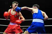 21 January 2023; Sean Purcell of Saviours Crystal Boxing Club, Waterford, right, and Paul Loonam of St Carthages Boxing Club, Offaly, during their featherweight 57kg final bout at the IABA National Elite Boxing Championships Finals at the National Boxing Stadium in Dublin. Photo by Seb Daly/Sportsfile