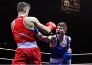 21 January 2023; Jason Nevin of Olympic Boxing Club, Westmeath, right, and Davey Joyce of Holy Family Drogheda Boxing Club, Louth, during their lightweight 60kg final bout at the IABA National Elite Boxing Championships Finals at the National Boxing Stadium in Dublin. Photo by Seb Daly/Sportsfile