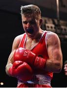 21 January 2023; Davey Joyce of Holy Family Drogheda Boxing Club, Louth, celebrates during his bout with Jason Nevin of Olympic Boxing Club, Westmeath, in their lightweight 60kg final bout at the IABA National Elite Boxing Championships Finals at the National Boxing Stadium in Dublin. Photo by Seb Daly/Sportsfile