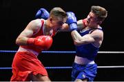 21 January 2023; Davey Joyce of Holy Family Drogheda Boxing Club, Louth, left, and Jason Nevin of Olympic Boxing Club, Westmeath, during their lightweight 60kg final bout at the IABA National Elite Boxing Championships Finals at the National Boxing Stadium in Dublin. Photo by Seb Daly/Sportsfile