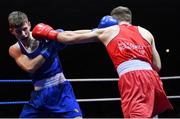 21 January 2023; Jason Nevin of Olympic Boxing Club, Westmeath, left, and Davey Joyce of Holy Family Drogheda Boxing Club, Louth, during their lightweight 60kg final bout at the IABA National Elite Boxing Championships Finals at the National Boxing Stadium in Dublin. Photo by Seb Daly/Sportsfile