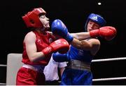 21 January 2023; Nicole Buckley of St Carthages Boxing Club, Offaly, left, and Ciara Walsh of Smithfield Boxing Club, Dublin, during their minimumweight 48kg final bout at the IABA National Elite Boxing Championships Finals at the National Boxing Stadium in Dublin. Photo by Seb Daly/Sportsfile