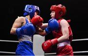 21 January 2023; Nicole Buckley of St Carthages Boxing Club, Offaly, right, and Ciara Walsh of Smithfield Boxing Club, Dublin, during their minimumweight 48kg final bout at the IABA National Elite Boxing Championships Finals at the National Boxing Stadium in Dublin. Photo by Seb Daly/Sportsfile