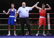 21 January 2023; Davey Joyce of Holy Family Drogheda Boxing Club, Louth, right, celebrates after his victory over Jason Nevin of Olympic Boxing Club, Westmeath, in their lightweight 60kg final bout at the IABA National Elite Boxing Championships Finals at the National Boxing Stadium in Dublin. Photo by Seb Daly/Sportsfile
