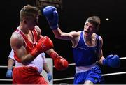 21 January 2023; Jason Nevin of Olympic Boxing Club, Westmeath, right, and Davey Joyce of Holy Family Drogheda Boxing Club, Louth, during their lightweight 60kg final bout at the IABA National Elite Boxing Championships Finals at the National Boxing Stadium in Dublin. Photo by Seb Daly/Sportsfile
