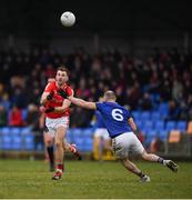 21 January 2023; Sam Mulroy of Louth in action against Gary Rogers of Longford during the O'Byrne Cup Final match between Longford and Louth at Glennon Brothers Pearse Park in Longford. Photo by Ray McManus/Sportsfile