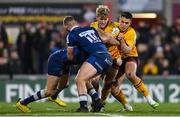 21 January 2023; Rob Lyttle of Ulster, supported by James Hume, is tackled by Sam James, left, and Robert du Preez of Sale Sharks during the Heineken Champions Cup Pool B Round 4 match between Ulster and Sale Sharks at Kingspan Stadium in Belfast. Photo by Ramsey Cardy/Sportsfile