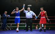 21 January 2023; Dylan Eagleson of St Paul's ABC, Antrim, left, celebrates victory over Jorge Rogla Castano of Corinthians Boxing Club, Dublin, in their bantamweight 54kg final bout at the IABA National Elite Boxing Championships Finals at the National Boxing Stadium in Dublin. Photo by Seb Daly/Sportsfile