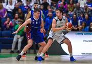 21 January 2023; Kristijan Andabaka of DBS Éanna in action against Stephen Commins of University of Galway Maree during the Basketball Ireland Pat Duffy National Cup Final match between DBS Éanna and University of Galway Maree at National Basketball Arena in Tallaght, Dublin. Photo by Ben McShane/Sportsfile