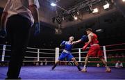 21 January 2023; Ryan McCarthy of Fr Horgan's Boxing Club, Cork, left, and Eugene McKeever of Holy Family Drogheda Boxing Club, Louth, during their welterweight 67kg final bout at the IABA National Elite Boxing Championships Finals at the National Boxing Stadium in Dublin. Photo by Seb Daly/Sportsfile