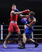 21 January 2023; Eugene McKeever of Holy Family Drogheda Boxing Club, Louth, left, and Ryan McCarthy of Fr Horgan's Boxing Club, Cork, during their welterweight 67kg final bout at the IABA National Elite Boxing Championships Finals at the National Boxing Stadium in Dublin. Photo by Seb Daly/Sportsfile