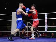 21 January 2023; Eugene McKeever of Holy Family Drogheda Boxing Club, Louth, right, and Ryan McCarthy of Fr Horgan's Boxing Club, Cork, during their welterweight 67kg final bout at the IABA National Elite Boxing Championships Finals at the National Boxing Stadium in Dublin. Photo by Seb Daly/Sportsfile