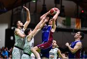 21 January 2023; John Burke of University of Galway Maree attempts a lay-up despite the attention of Kristijan Andabaka, centre, and Nathan Comerford of DBS Éanna during the Basketball Ireland Pat Duffy National Cup Final match between DBS Éanna and University of Galway Maree at National Basketball Arena in Tallaght, Dublin. Photo by Ben McShane/Sportsfile