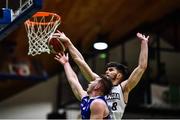 21 January 2023; Stefan Desnica of DBS Éanna blocks the lay-up of Stephen Commins of University of Galway Maree during the Basketball Ireland Pat Duffy National Cup Final match between DBS Éanna and University of Galway Maree at National Basketball Arena in Tallaght, Dublin. Photo by Ben McShane/Sportsfile