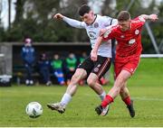 21 January 2023; Kameron Ledwidge of Shelbourne in action against Alistair Coote of Bohemians during the Pre-Season Friendly match between Shelbourne and Bohemians at AUL Complex in Clonshaugh, Dublin. Photo by Tyler Miller/Sportsfile