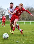21 January 2023; Shane Farrell of Shelbourne is tackled by Adam McDonnell of Bohemians during the Pre-Season Friendly match between Shelbourne and Bohemians at AUL Complex in Clonshaugh, Dublin. Photo by Tyler Miller/Sportsfile