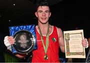 21 January 2023; Eugene McKeever of Holy Family Drogheda Boxing Club, Louth, celebrates with his trophy after victory over Ryan McCarthy of Fr Horgan's Boxing Club, Cork, during their welterweight 67kg final bout at the IABA National Elite Boxing Championships Finals at the National Boxing Stadium in Dublin. Photo by Seb Daly/Sportsfile
