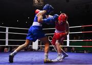 21 January 2023; Caitlin Fryers of Immaculata ABC, Belfast, right, and Daina Moorehouse of Enniskerry Boxing Club, Wicklow, during their light flyweight 50kg final bout at the IABA National Elite Boxing Championships Finals at the National Boxing Stadium in Dublin. Photo by Seb Daly/Sportsfile