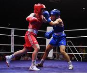 21 January 2023; Caitlin Fryers of Immaculata ABC, Belfast, left, and Daina Moorehouse of Enniskerry Boxing Club, Wicklow, during their light flyweight 50kg final bout at the IABA National Elite Boxing Championships Finals at the National Boxing Stadium in Dublin. Photo by Seb Daly/Sportsfile
