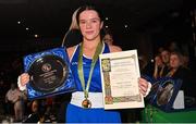 21 January 2023; Daina Moorehouse of Enniskerry Boxing Club, Wicklow, celebrates with her trophy after victory over Caitlin Fryers of Immaculata ABC, Belfast, their light flyweight 50kg final bout at the IABA National Elite Boxing Championships Finals at the National Boxing Stadium in Dublin. Photo by Seb Daly/Sportsfile