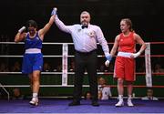21 January 2023; Daina Moorehouse of Enniskerry Boxing Club, Wicklow, left, celebrates victory over Caitlin Fryers of Immaculata ABC, Belfast, in their light flyweight 50kg final bout at the IABA National Elite Boxing Championships Finals at the National Boxing Stadium in Dublin. Photo by Seb Daly/Sportsfile